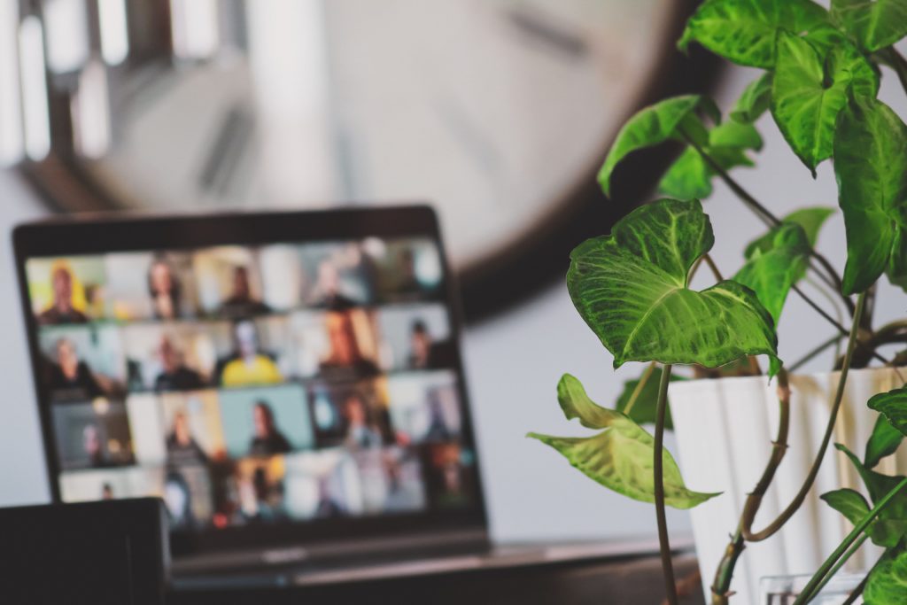 Desk with a plant close by